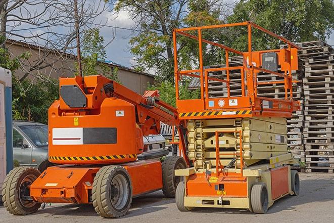 forklift transporting goods in a busy warehouse setting in Lansdowne VA